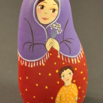 Painted Pebble Nativity. Shepherdess and child.